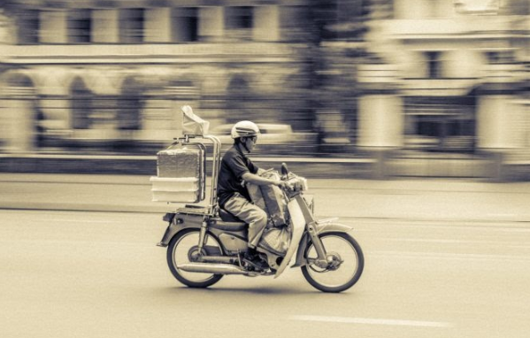 Food delivery services in Japan Takeaway Driver on Bike