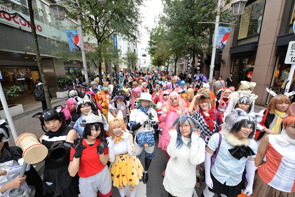 Crowd of Japanese People Celebrating Halloween at a Street Party