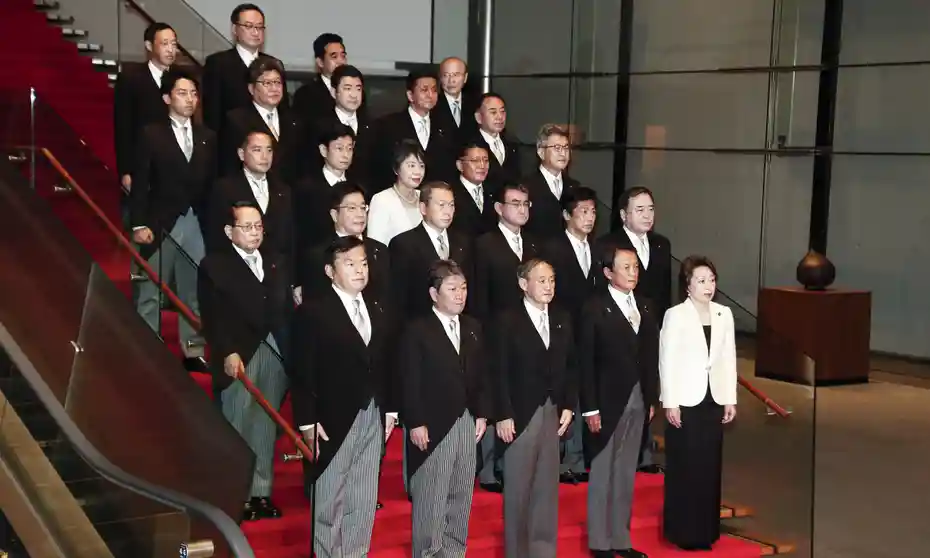 A picture of 24 Japanese politicans. Only two are female. This highlights gender inequality in Japan.