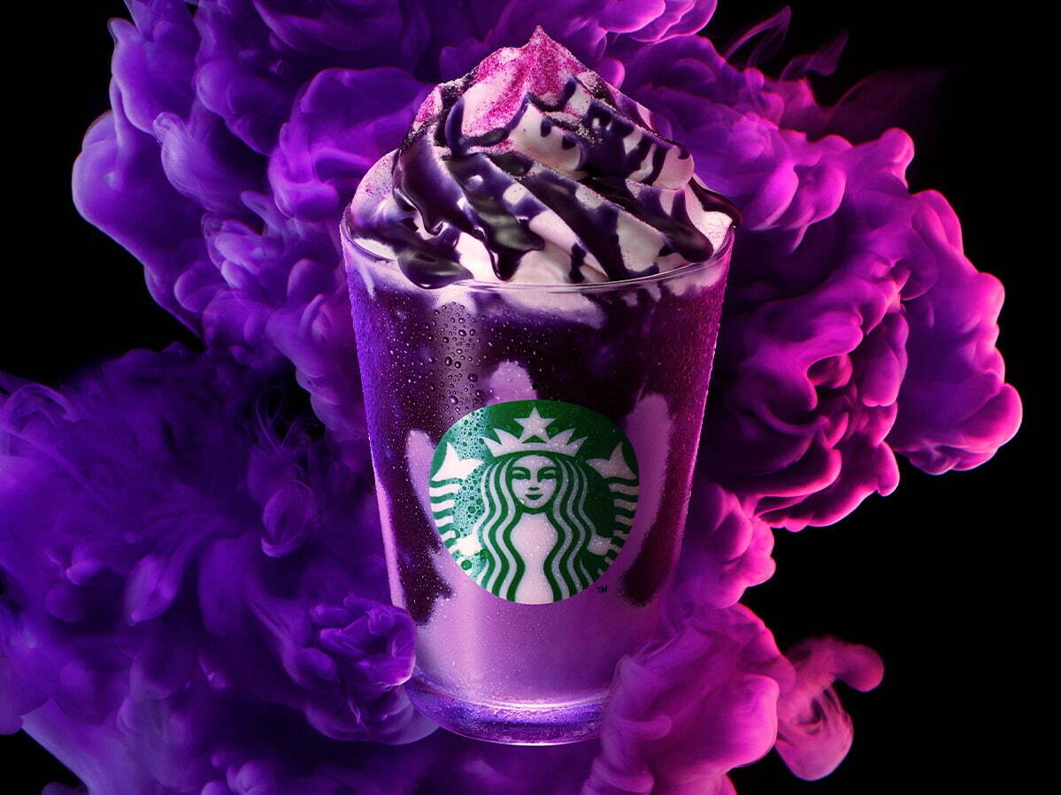 Starbucks' 2022 Halloween limited edition purple sweet potato drink. There is a mysterious fog in the background.