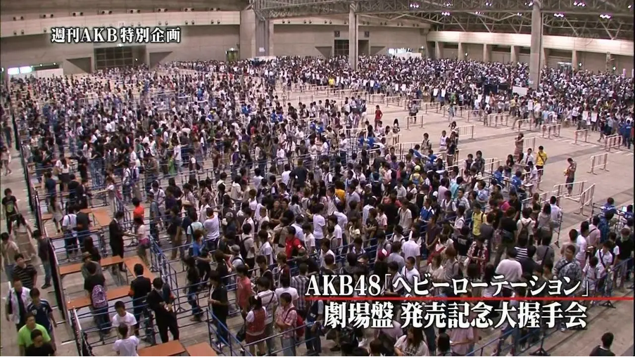 Fans of the jpop group AKB48 lining up for a handshake event with the group.